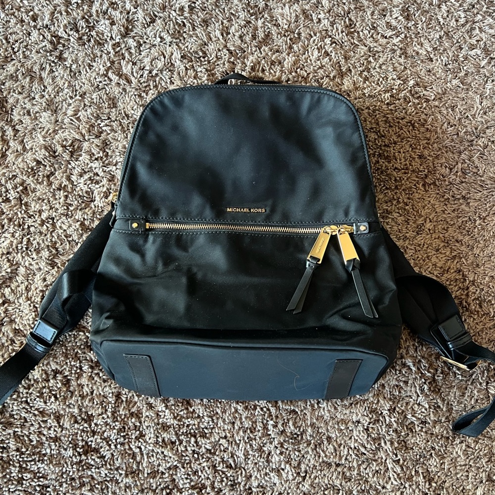 Michael Kors Polly Medium Slim Backpack.                       EUC